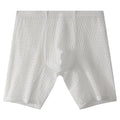 Men's white lace boxer shorts with lengthened legs and a mid-waist fit on a grey background.