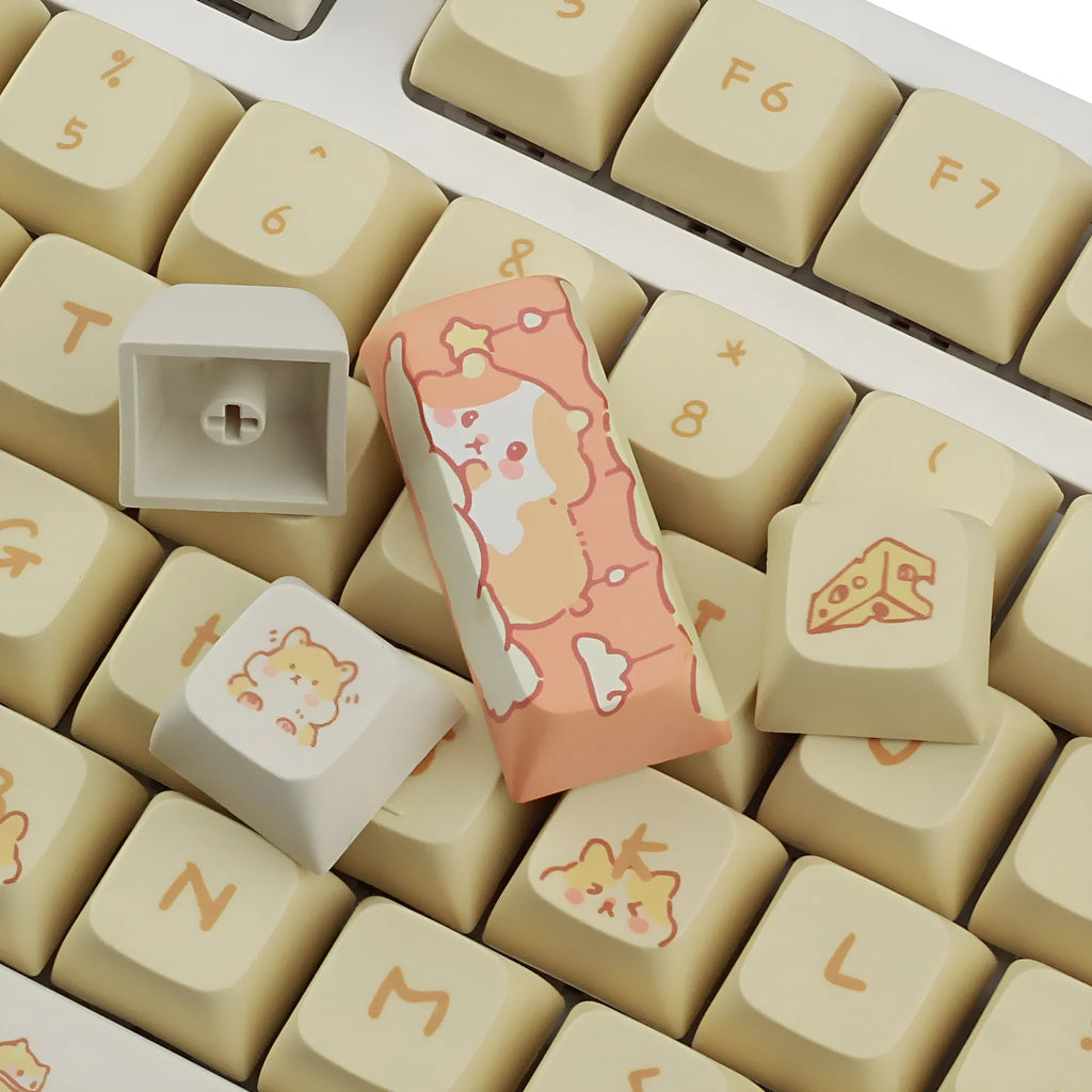 XDA profile mechanical keyboard keycaps in custard colour with mouse grey and yellow designs