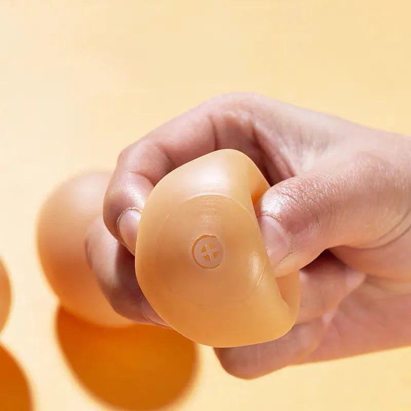 Dog simulation egg chew toy with textured surface for dental hygiene and sound feature