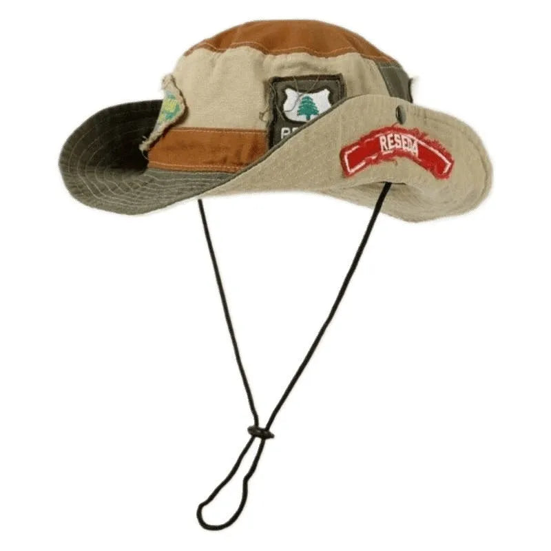 Women's army green cotton fisherman hat with hand-painted patchwork design and flat top crown