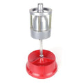 Portable aluminium hub balancer for car and truck tyres with 1.5 to 4 inch hub range on enamel-finished base.