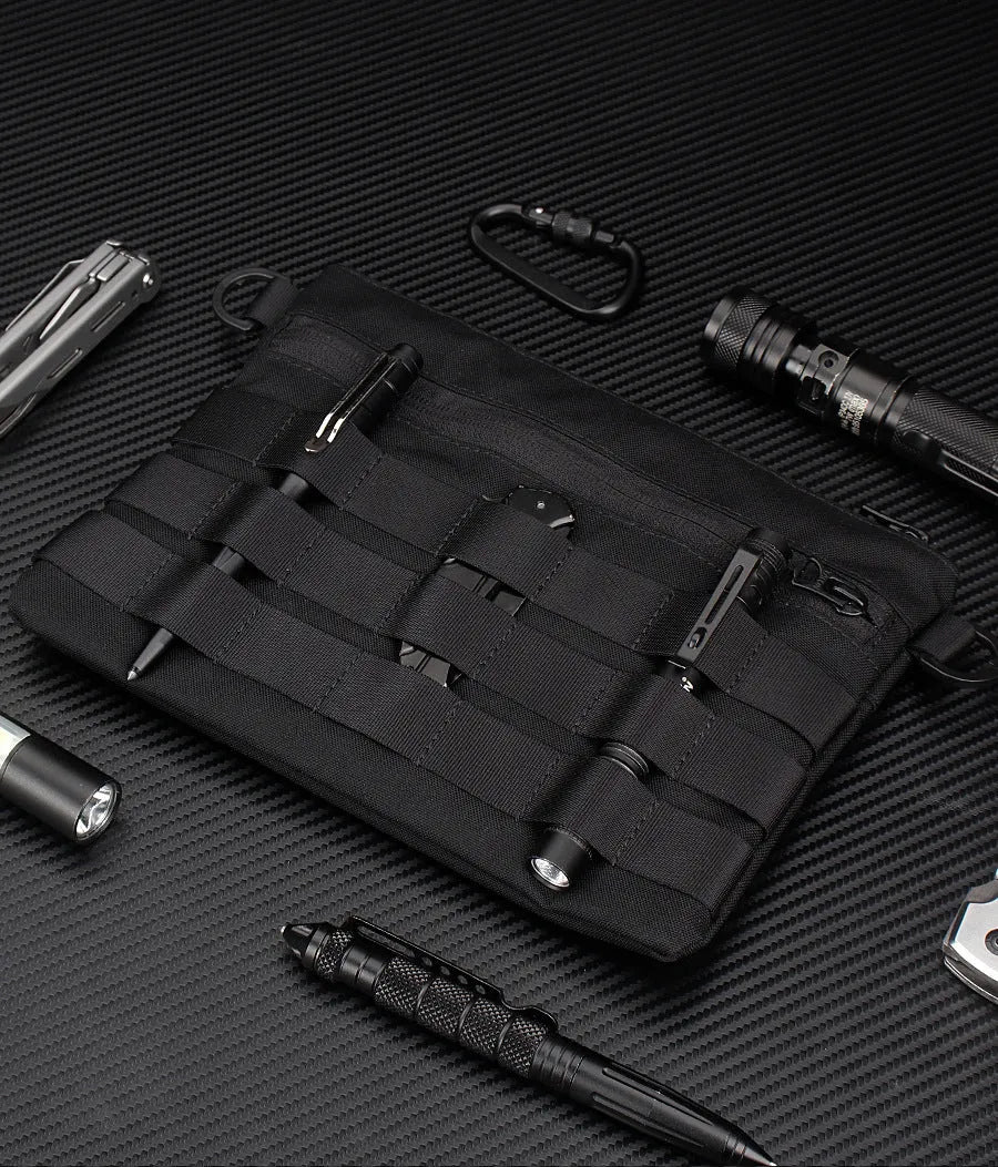 Black Oxford cloth portable outdoor organiser kit measuring 18cm by 3.5cm