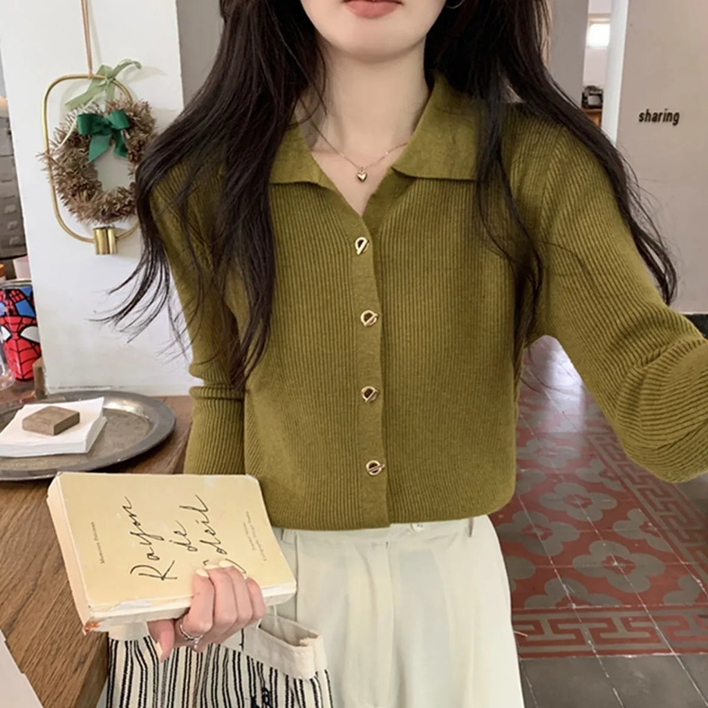 Long-sleeved oversized viscose cardigan in beige, black, oatmeal, green, or khaki, laid flat.