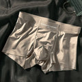 Men's Ice Silk satin knit underwear in mid-waist traceless design shown in coffee colour.