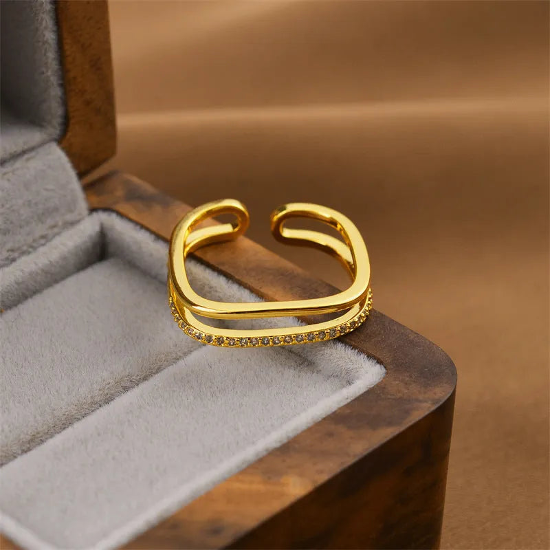 Korean geometric open ring in gold colour with electroplated finish on copper