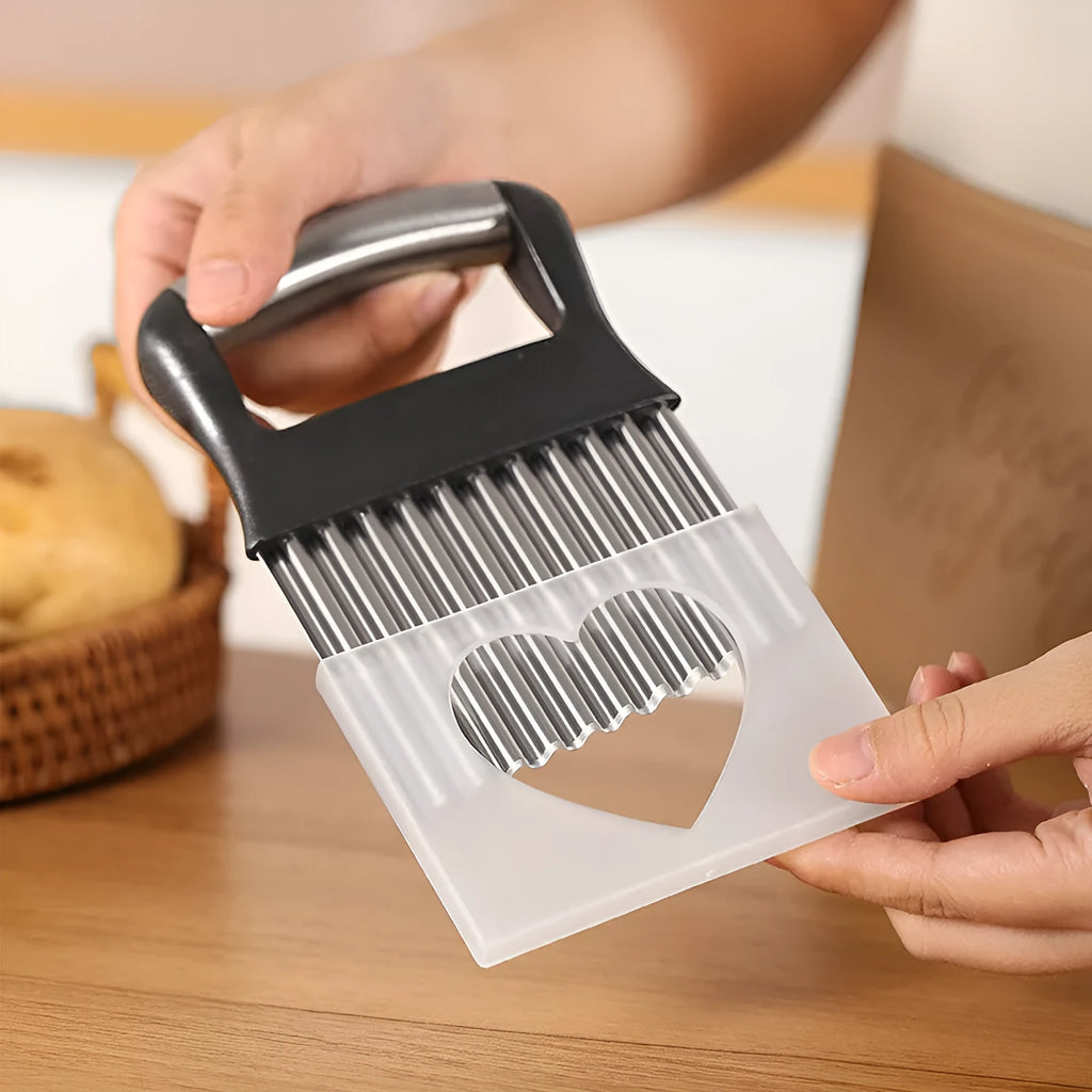 Stainless steel potato wave knife for cutting crinkle chips, shown on a kitchen surface.