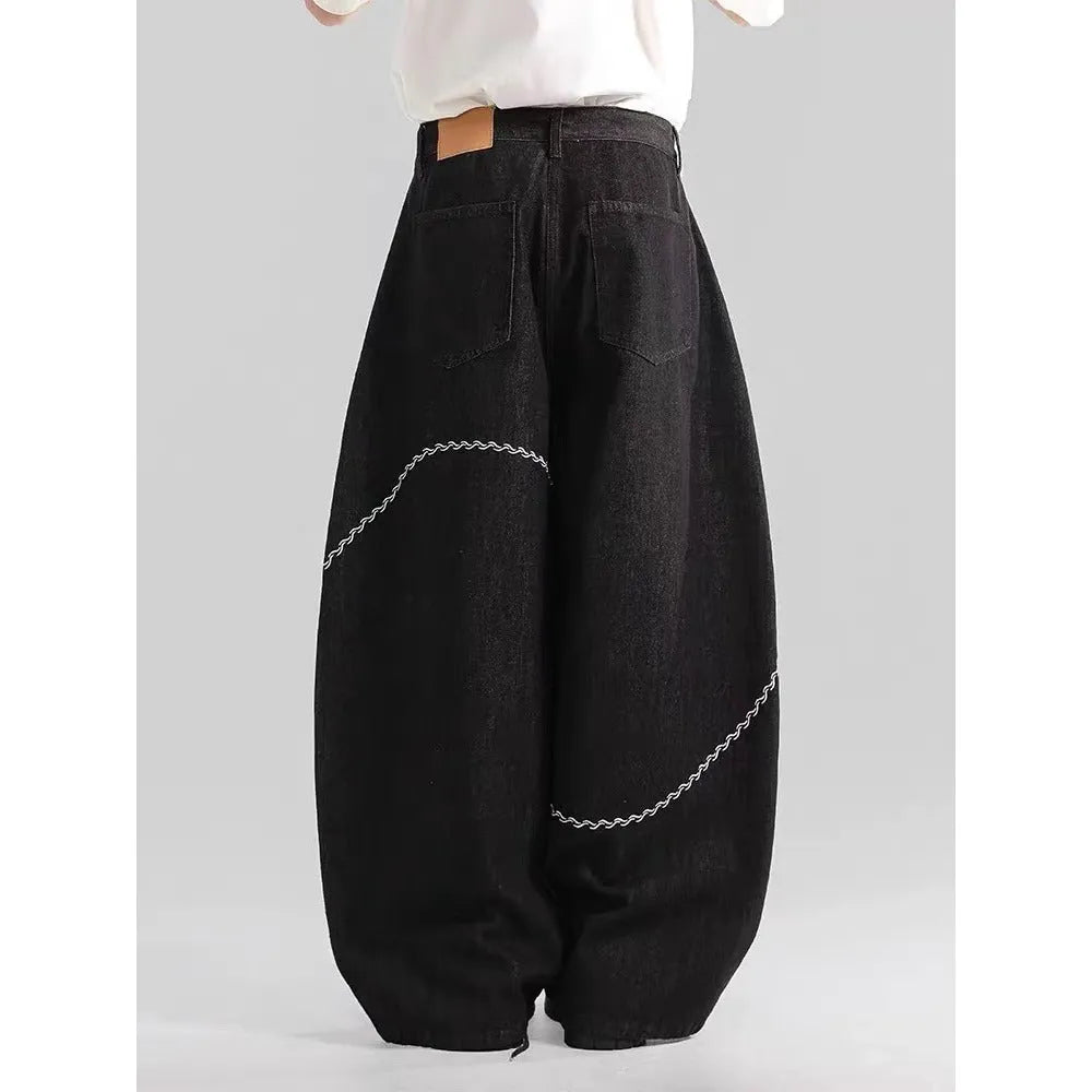 Black straight-leg trousers with mid waist and zip placket closure in polyester denim fabric