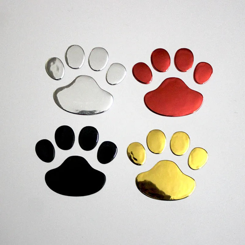 Hand-shaped brush outline car sticker with dog footprints, shown in black colour, measuring 7cm long.