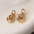 Gold geometric earrings with irregular shape and 20mm drop length for women