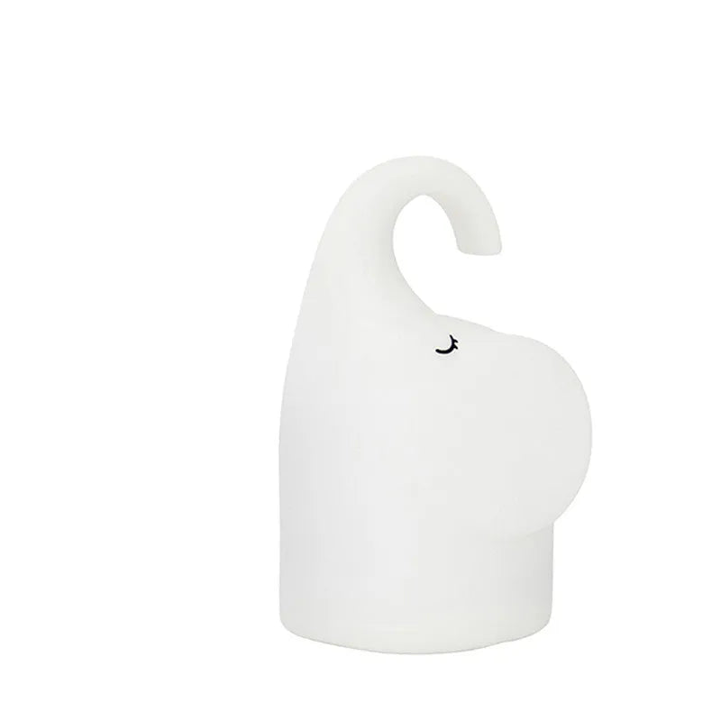 Elephant-shaped silicone night light with warm LED illumination for bedroom bedside use