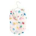 Colourful cartoon umbrella pattern dog raincoat in size L on a mannequin.