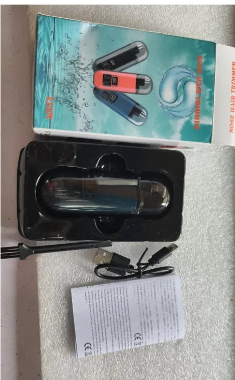 Rechargeable nose hair trimmer with digital display showing black, blue and orange colour options
