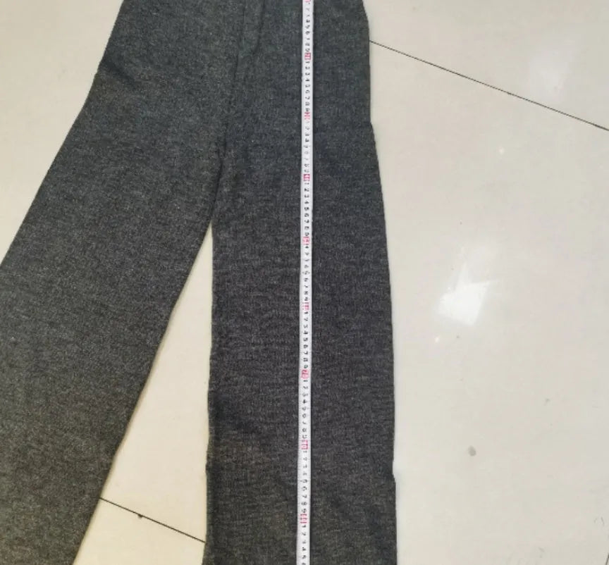Women's dark grey side-slit sweater with matching trousers two-piece suit on hanger