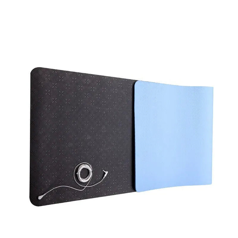 Blue conductive yoga mat with plants pattern, showing grounding wire and 182cm x 61cm x 5mm dimensions.