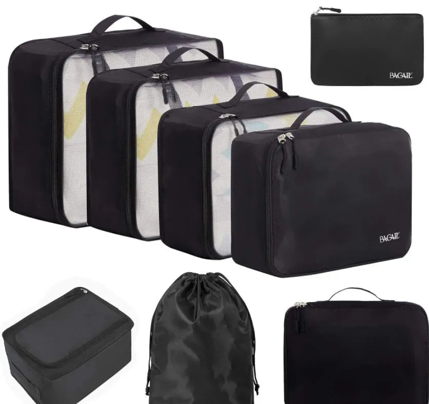 Cubic eight-piece travel packing set showing compression bags in various colours including beige, black, and pink leopard print