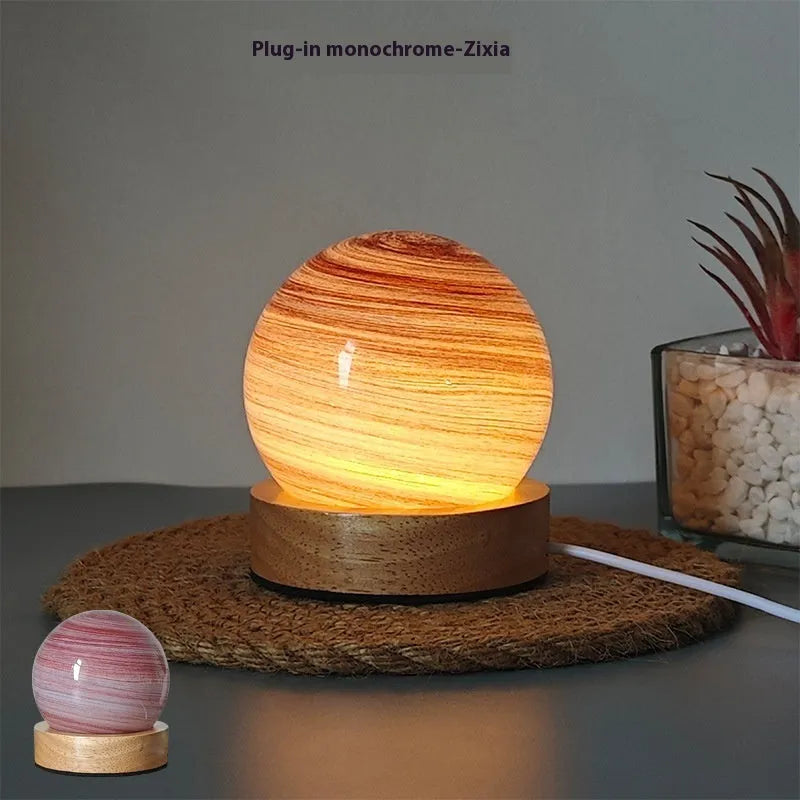 Modern planet-themed USB night light with dimming on a base, showing compact 80x90mm size.