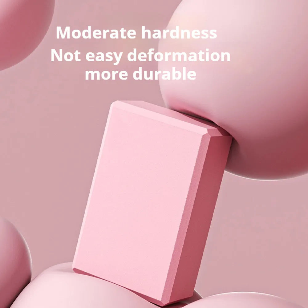 Solid colour EVA foam yoga brick with hexagonal ridged design for balance training