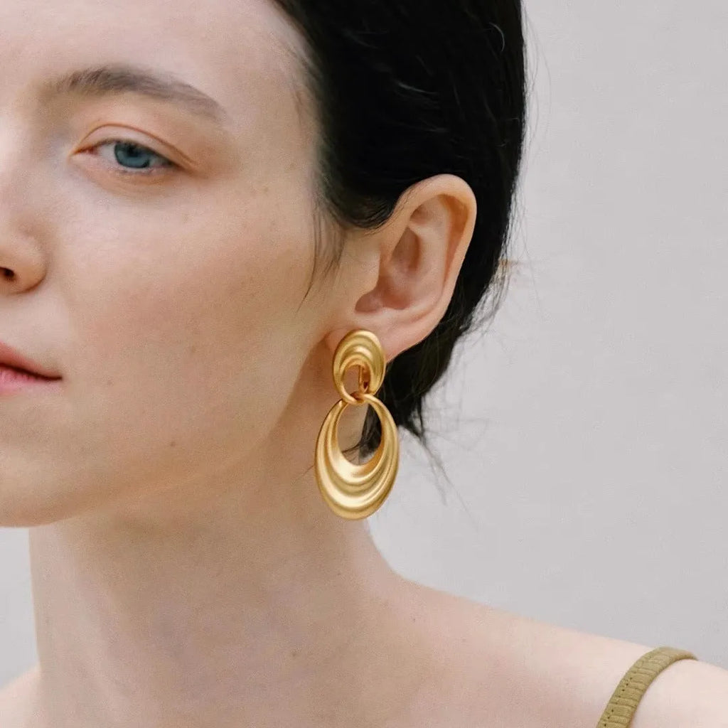Plain gold double circle French retro earrings with geometric design and U-shaped posts
