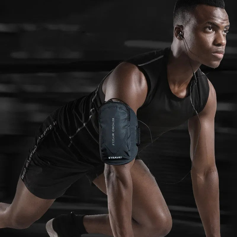 Reflective running arm bag in fluorescent yellow and black holding a smartphone for night safety during outdoor sports.