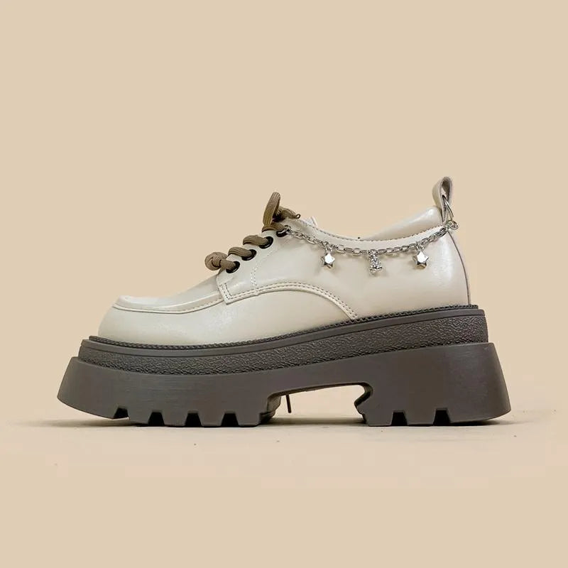 White platform Mary Jane shoes with round toe, lace-up front, and chunky 6-8cm heels
