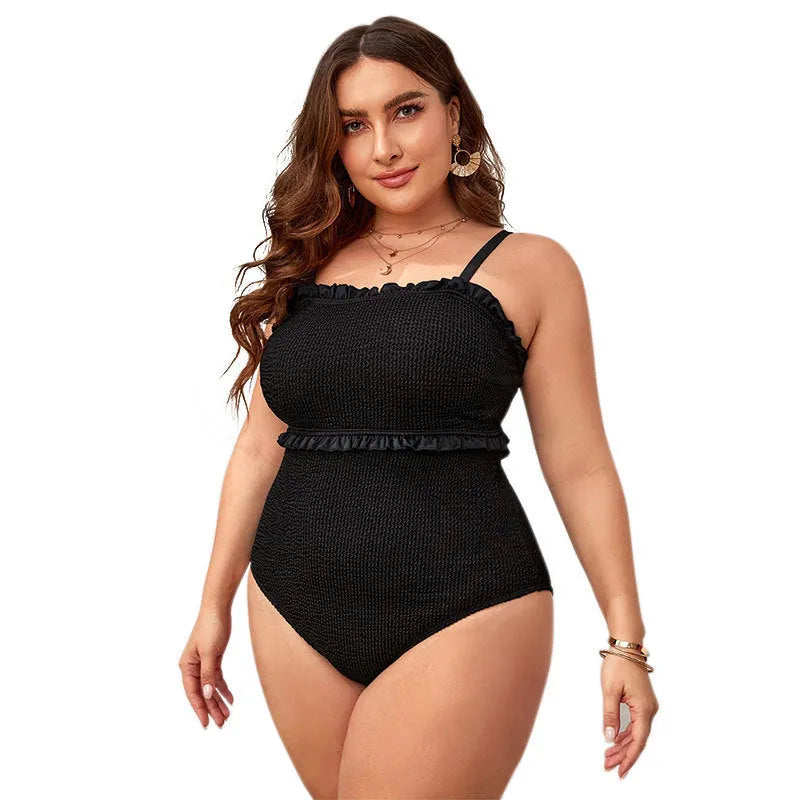 Black plus size women's one-piece swimsuit with double shoulder straps and briefs style.