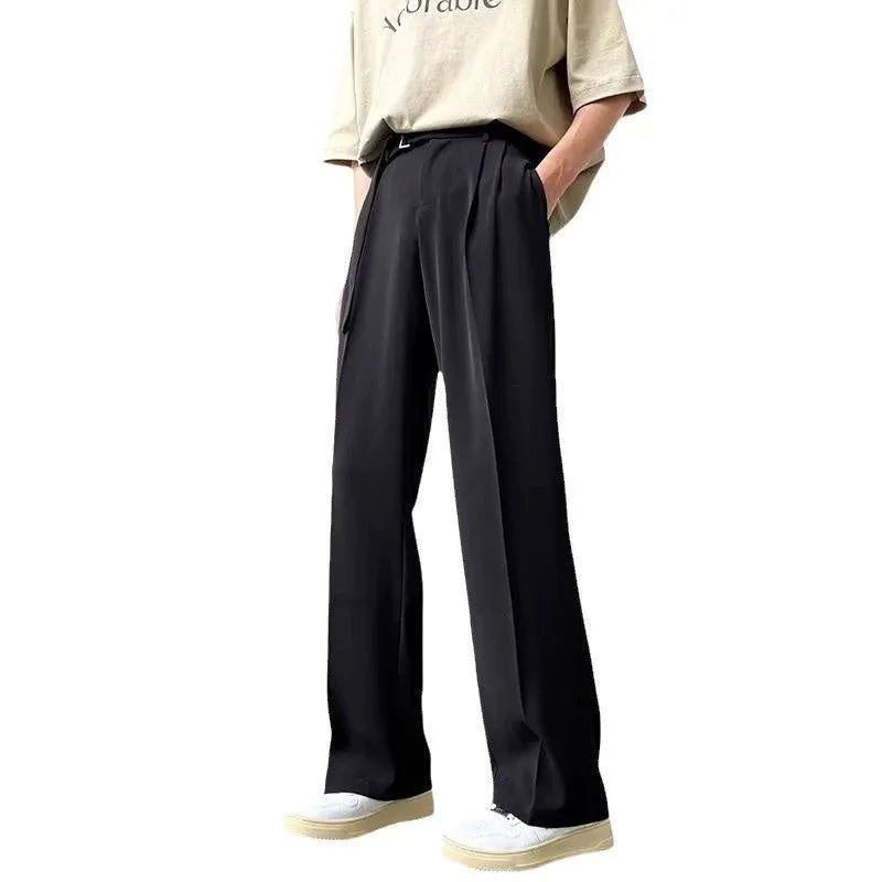 Thin straight wide leg loose fit trousers in black, showing the straight leg opening and casual drape