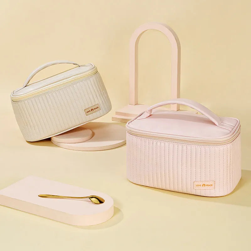 Open-top pink PU leather cosmetic bag with solid colour design