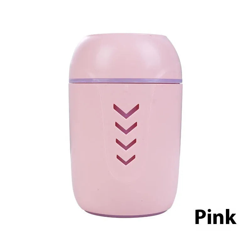 Compact round portable air purifier in blue colour with USB cable for car or desk use.