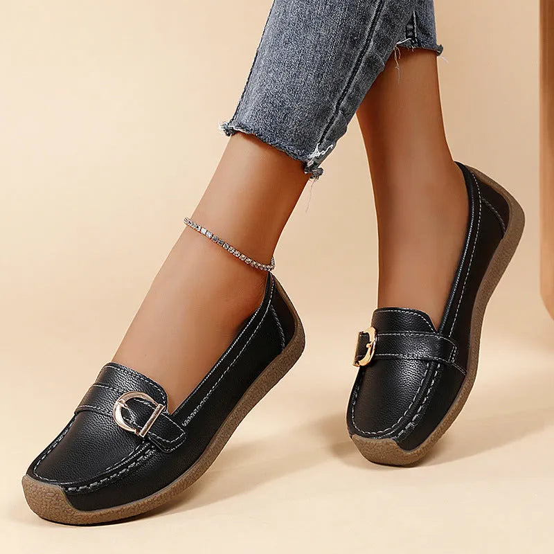 Women's casual loafers in artificial PU leather with round toe and beef tendon sole.