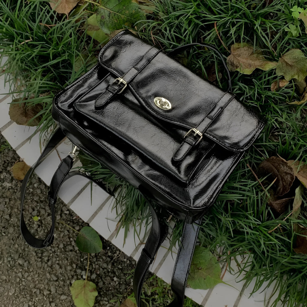 Black college messenger bag with oil wax PU leather appearance, 35cm size