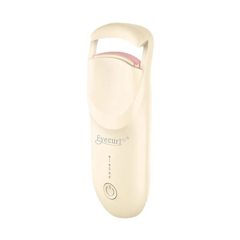 Electric heating eyelash curler with ceramic element in vanilla apricot colour with LED indicator light