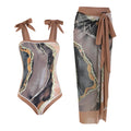 Floral-printed conservative one-piece swimsuit with mesh tube top and matching skirt