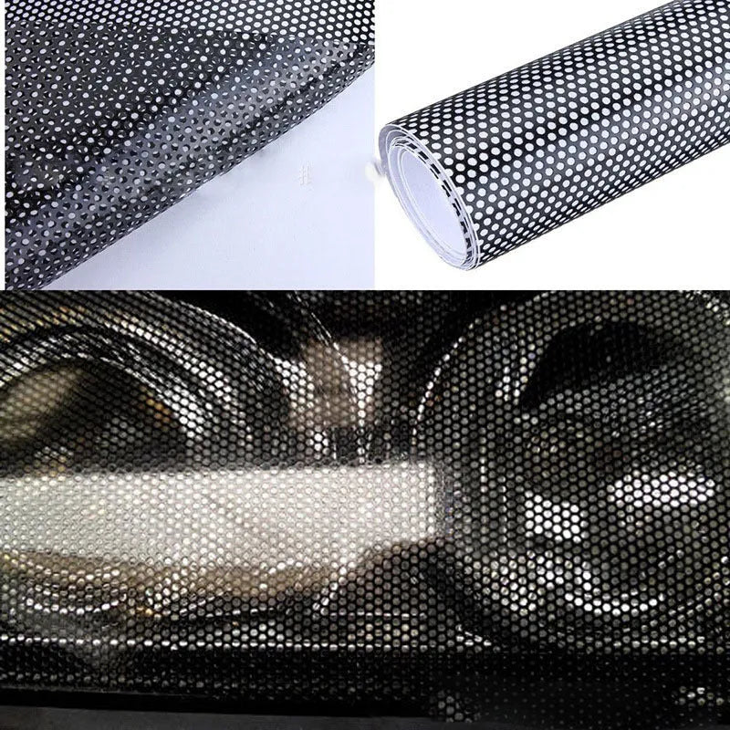 Roll of perforated mesh plastic adhesive film for DIY car wrapping, showing scale next to a 30cm ruler.