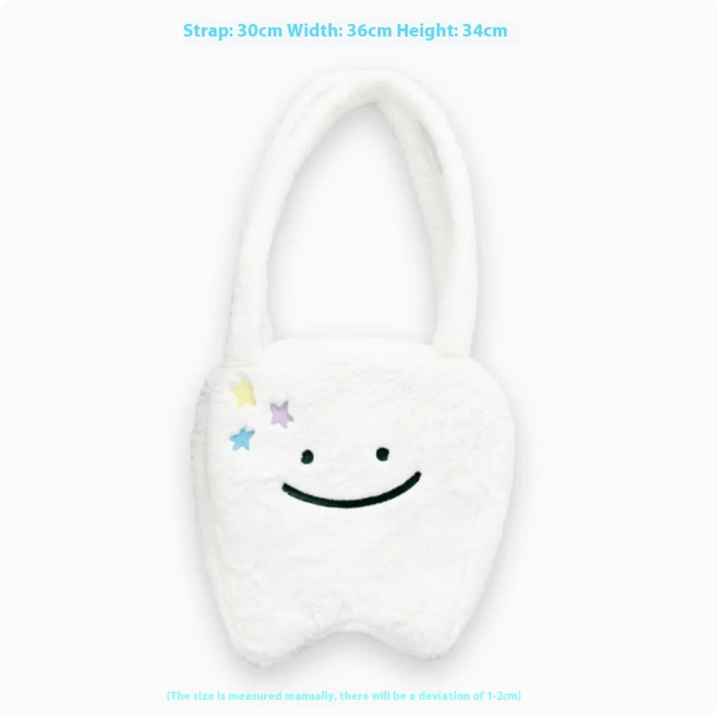 White plush shoulder tote bag with large tooth design and crossbody strap