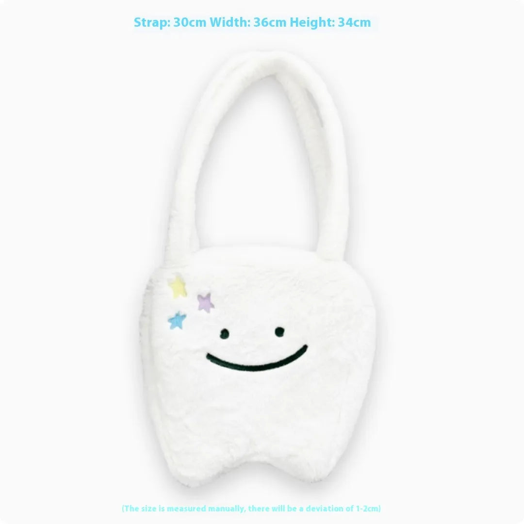 White plush shoulder tote bag with large tooth design and crossbody strap