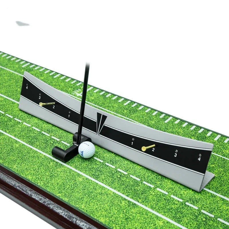 Golf putter trajectory balance simulator with adjustable push rod on a flat surface.
