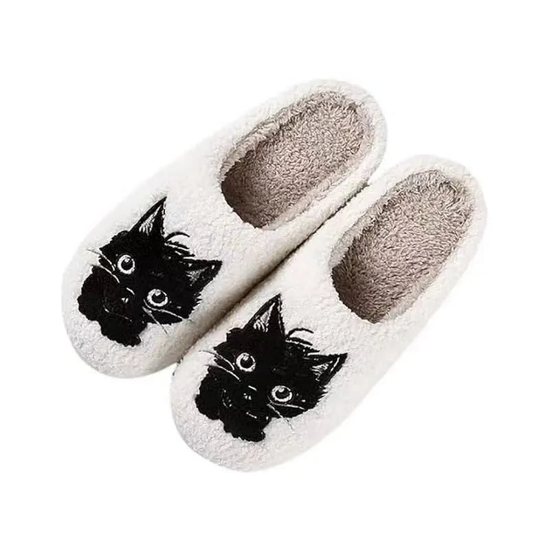White plush slippers with Black Beard Cat cartoon couple pattern, velvet lining, and a textured non-slip sole.