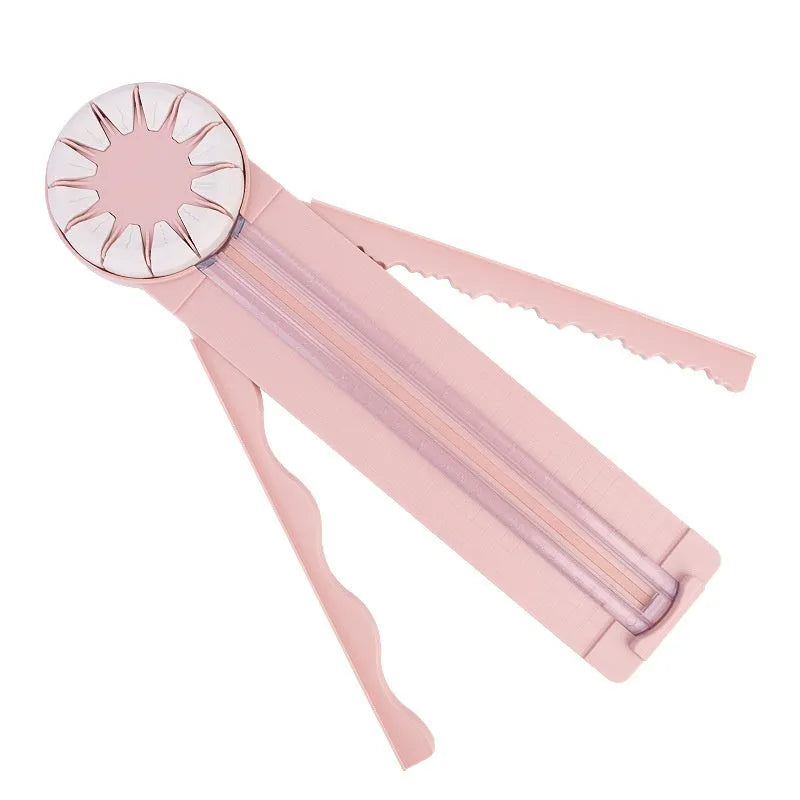 Pink plastic 12-in-1 manual paper cutting machine for decorative edges on craft paper