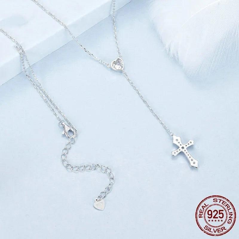 Silver necklace with V-neck cross pendant on O-ring chain in colour BSN384