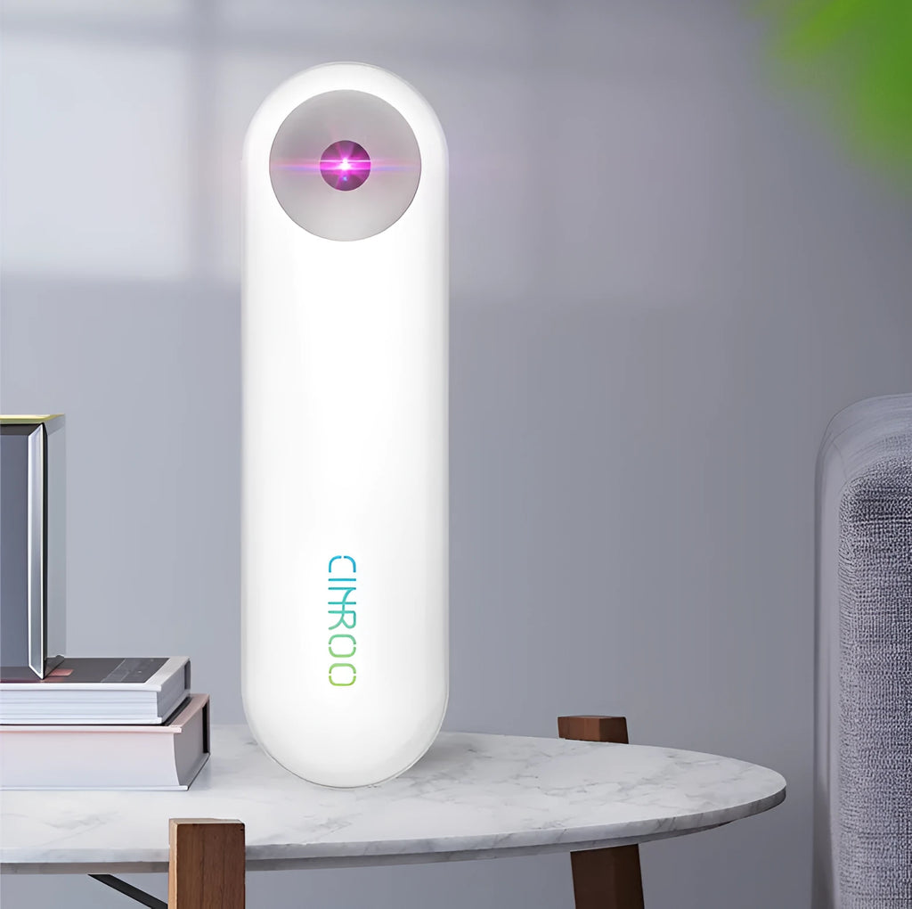 White portable UV sterilizer lamp showing compact dimensions for mobile disinfection use