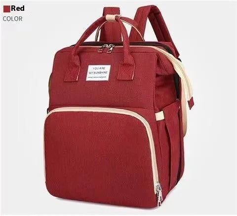 Lightweight folding mummy bag in nylon with USB interface and curved shoulder strap