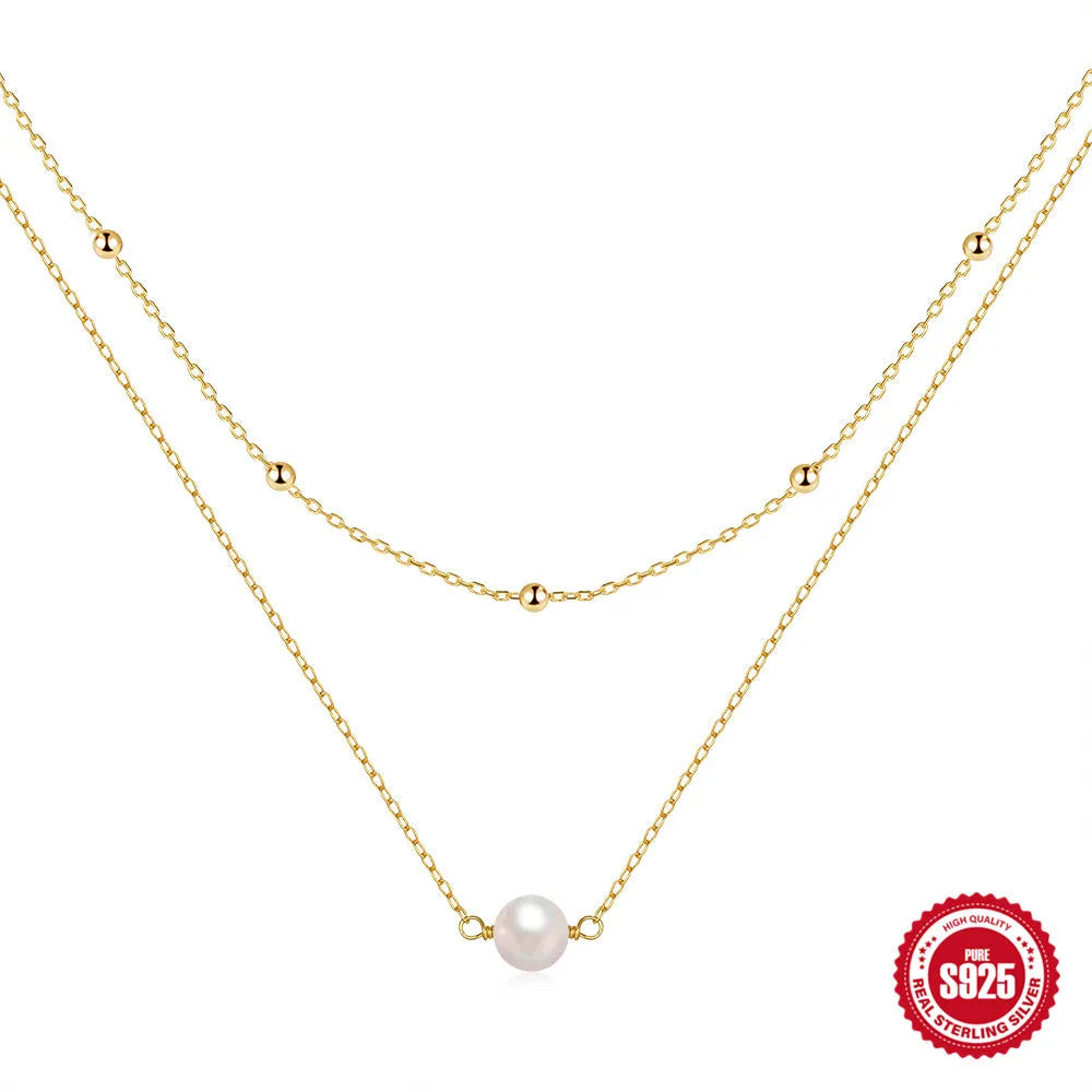 S925 sterling silver double layer necklace with twin pearl accents in gold colour