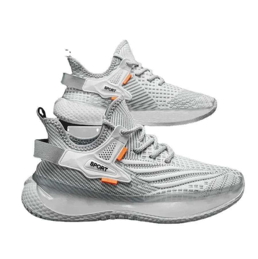 Men's low-top casual sneaker in woven mesh with a round toe and flat rubber sole.