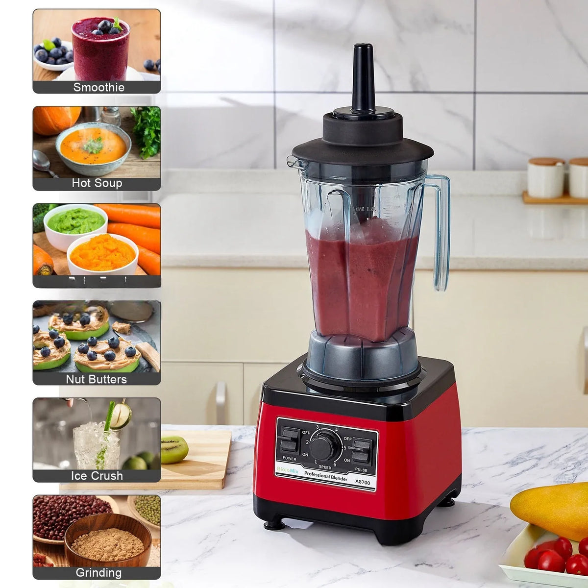 Red commercial blender with stainless steel jug, model A8700, on a countertop.