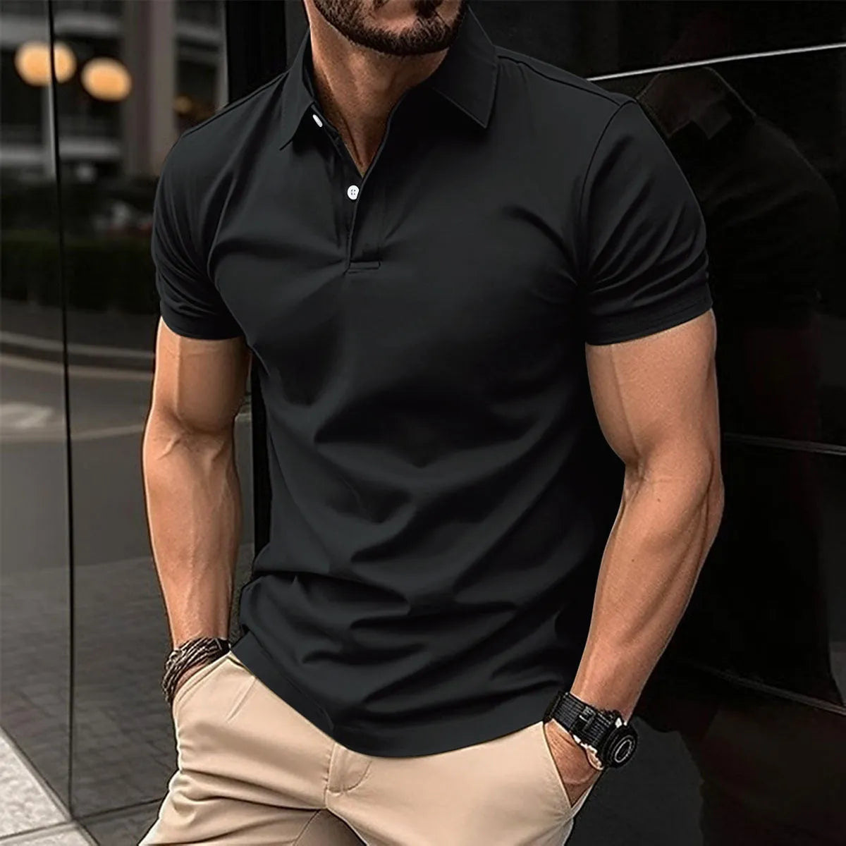 Men's solid colour short sleeve polo shirt with button-down lapel on a hanger.