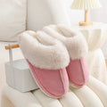 Pair of plush-lined indoor slippers with a flat PVC anti-slip sole, shown in a choice of colours.