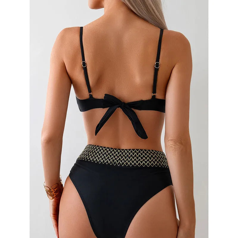 Black two-piece bikini swimsuit with sleeveless top and briefs on a mannequin