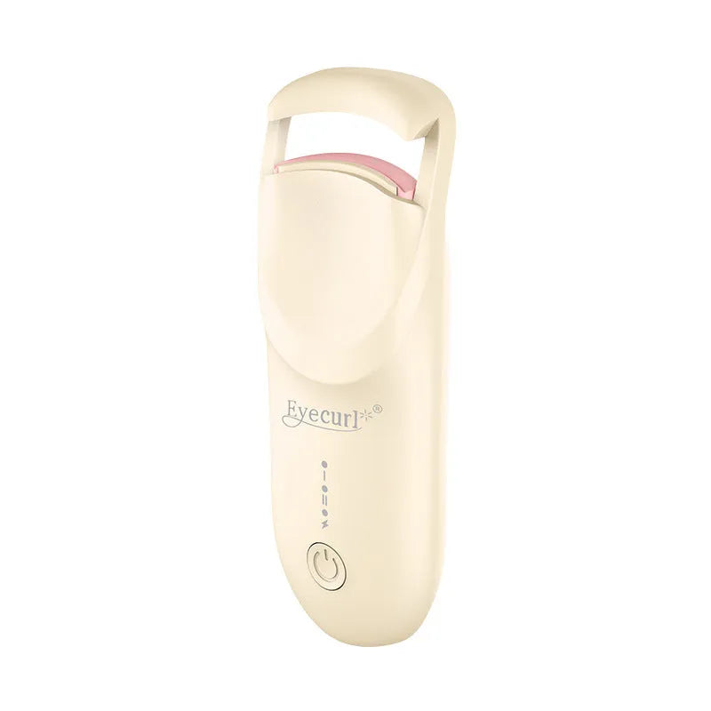 Electric heating eyelash curler with ceramic element in vanilla apricot colour with LED indicator light