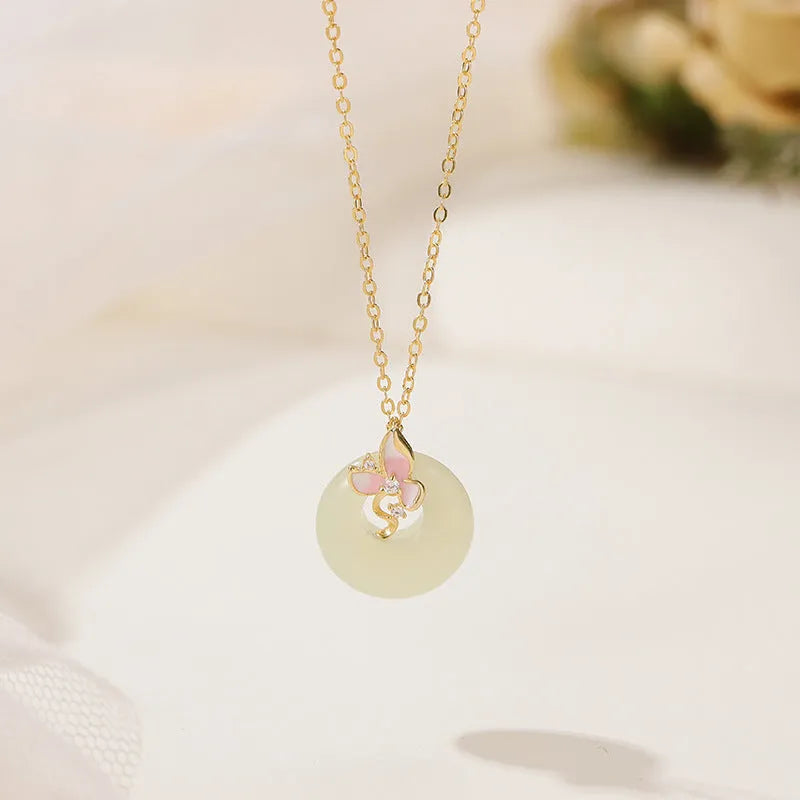 Girl's silver necklace with orchid flower pendant and safety buckle, with matching bracelet.