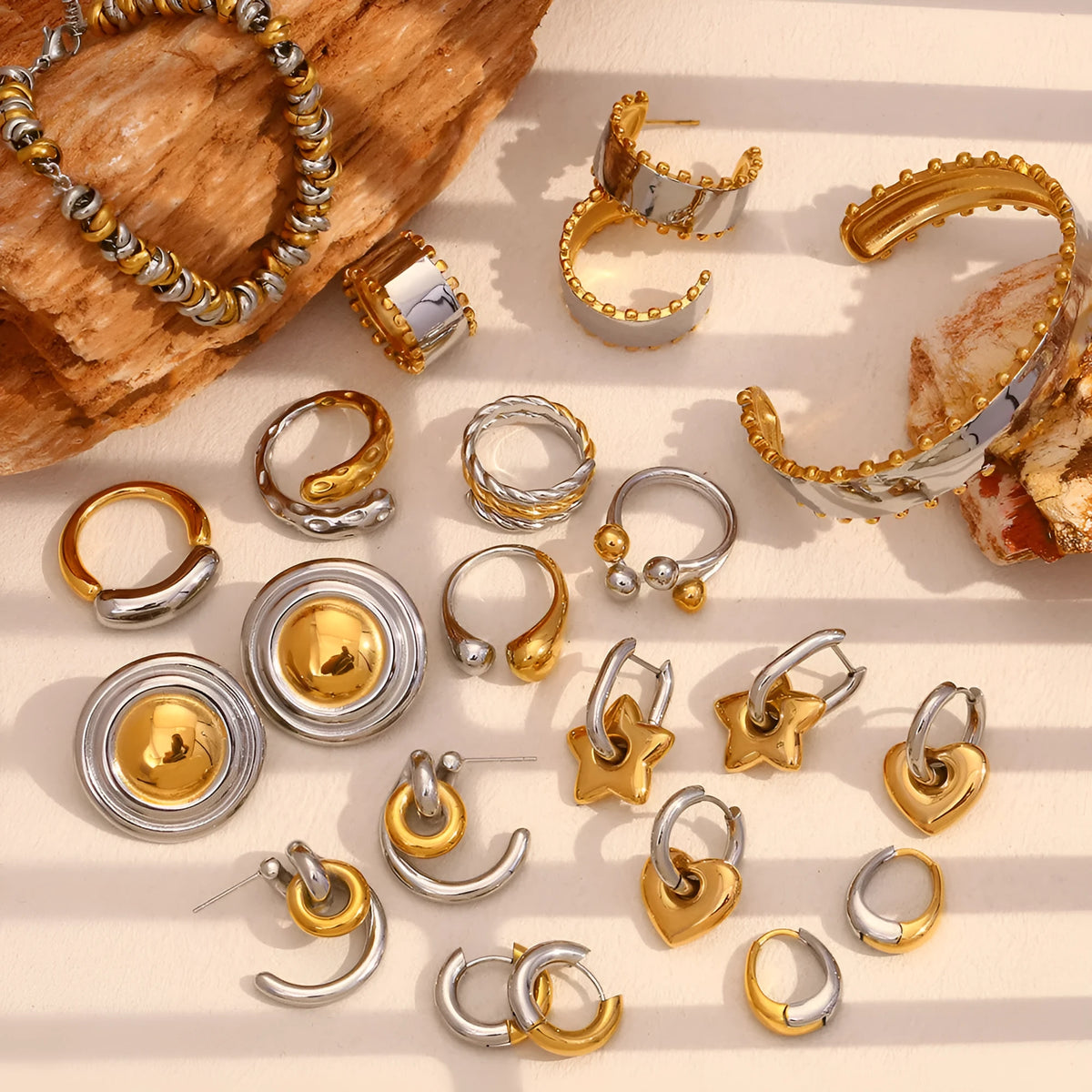 Women's gold tone geometric stainless steel jewellery set with earrings, bracelet and necklace